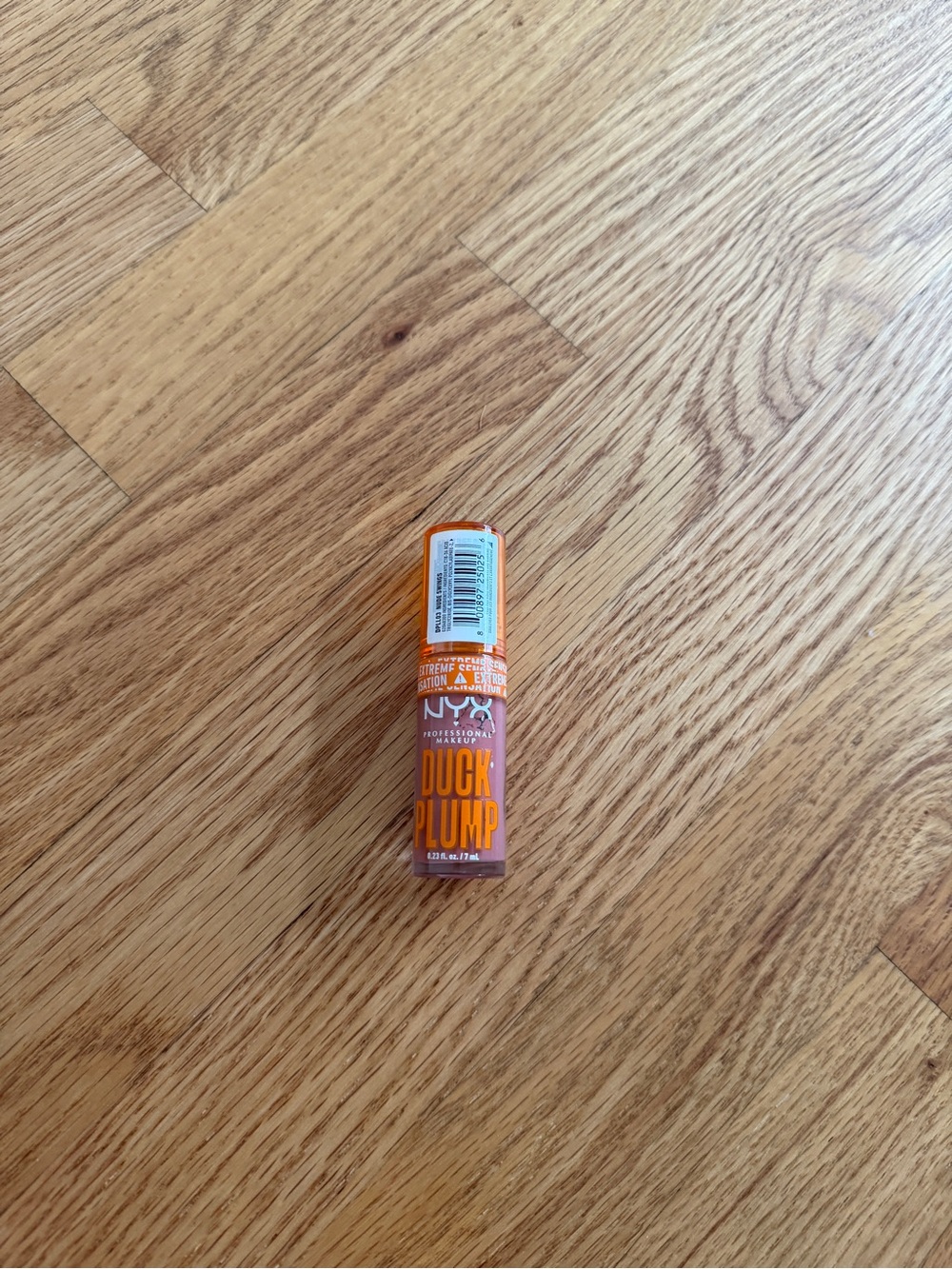 NYX duck plump nude swings lipgloss
